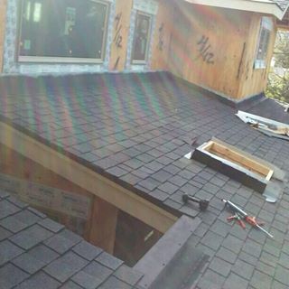 image of replacing skylights on roof